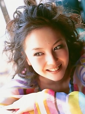 Captivating gravure idol chick enchants in her black lingerie