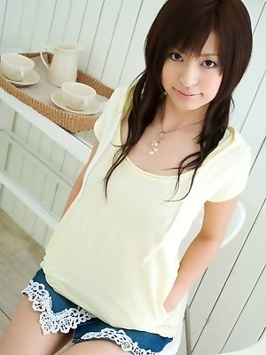 Cute Asian teen shows off her nice tits and then her hairy pussy